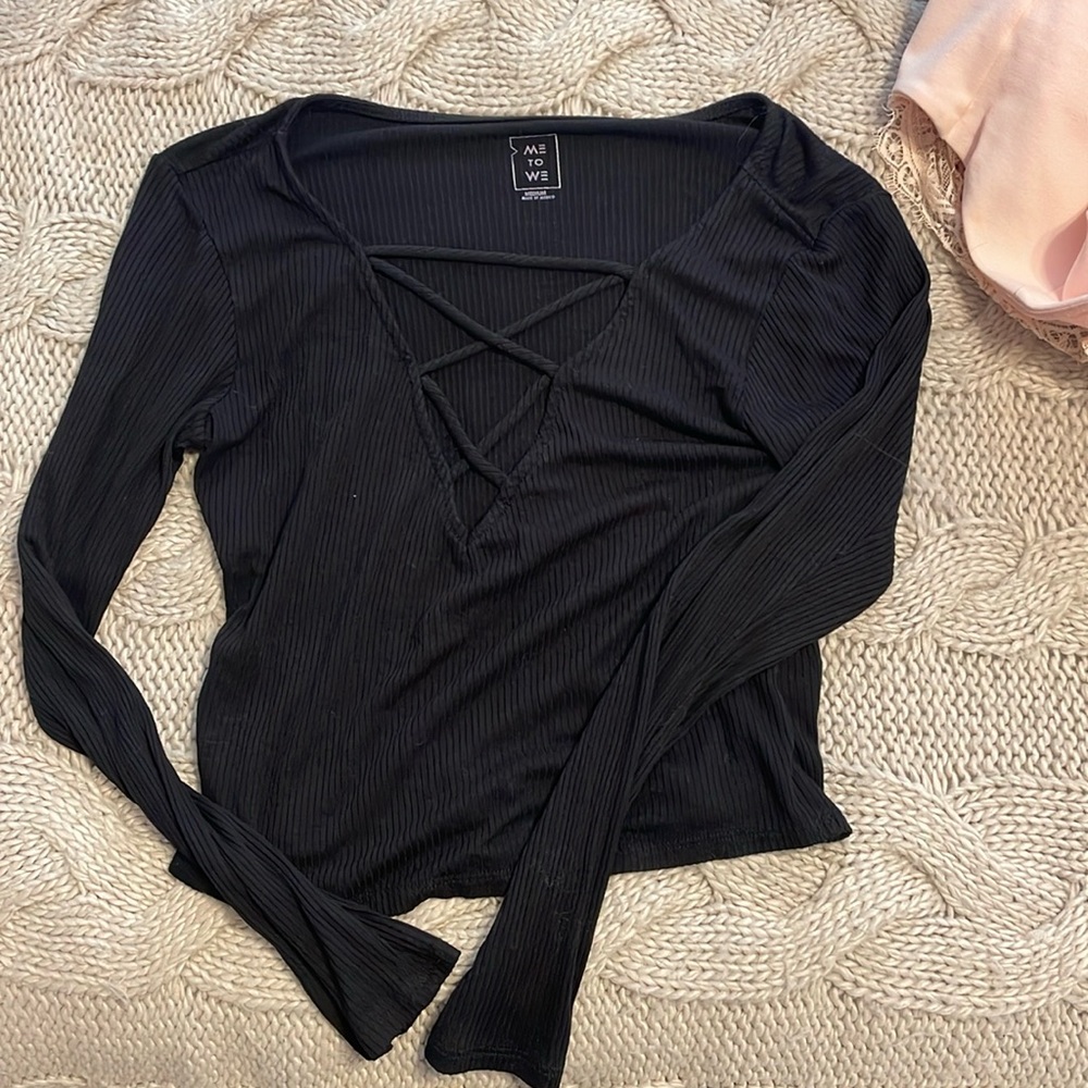 Black long sleeve low neck cut out